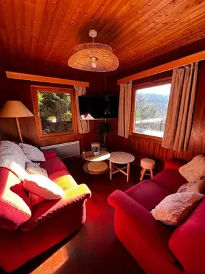 Coin salon dans l'établissement Chalet avec superbe vue dégagée - 10 min de Gérardmer