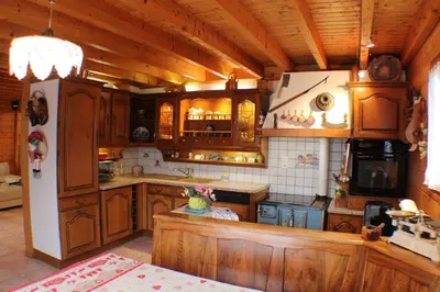 Cuisine ou kitchenette dans l'établissement Les champstousnods