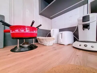 Cuisine ou kitchenette dans l'établissement Gîte Sao Tomé