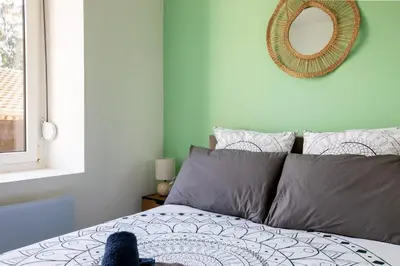 Un ou plusieurs lits dans un hébergement de l'établissement Proche centre ville, moderne & cosy, ultra calme
