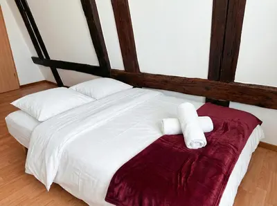 Un ou plusieurs lits dans un hébergement de l'établissement Le Cocon Alsacien au cœur de Rouffach