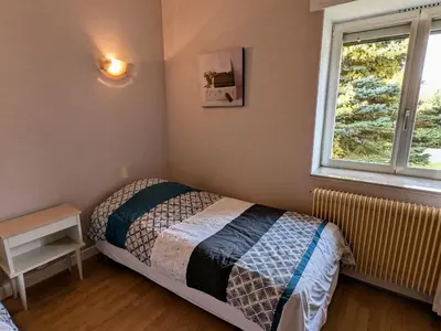 Un ou plusieurs lits dans un hébergement de l'établissement Gîte paisible au pied du Bassin de Champagney, animaux acceptés - FR-1-583-372