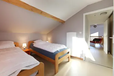 Un ou plusieurs lits dans un hébergement de l'établissement T2 duplex avec vue imprenable