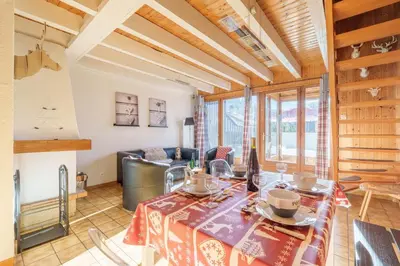 Coin salon dans l'établissement Le Refuge des Cerfs - Duplex vue montagne