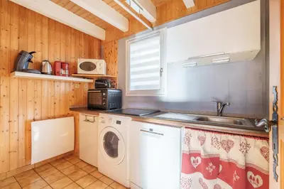 Cuisine ou kitchenette dans l'établissement Le Refuge des Cerfs - Duplex vue montagne