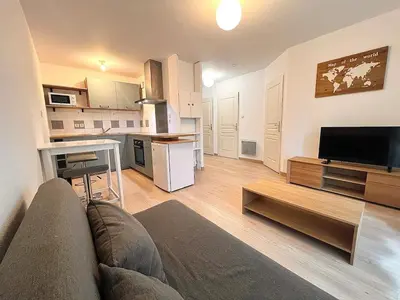 Cuisine ou kitchenette dans l'établissement Appartement Cosy à Belfort