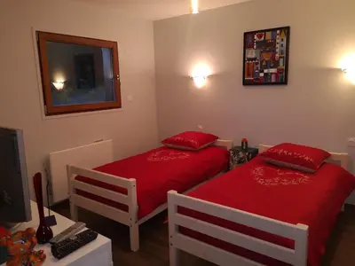 Un ou plusieurs lits dans un hébergement de l'établissement La Sérotine Chalet GERARDMER