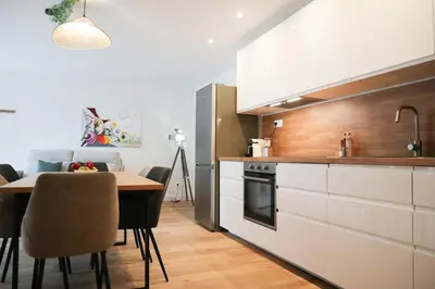 Cuisine ou kitchenette dans l'établissement Duplex Échanges complices ,Frontière