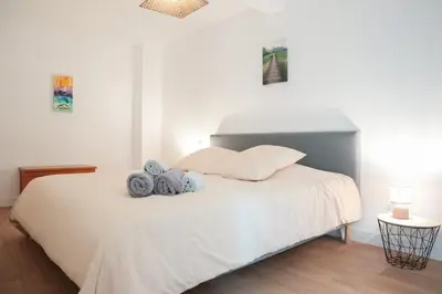 Un ou plusieurs lits dans un hébergement de l'établissement Duplex Harmonie proche frontière