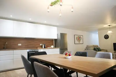 Cuisine ou kitchenette dans l'établissement Plaisir partagé Apartment