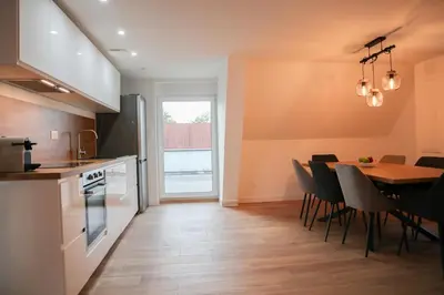 Cuisine ou kitchenette dans l'établissement Vivre ensemble - free parking