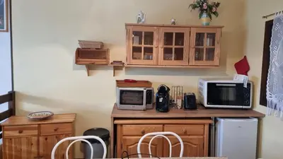 Cuisine ou kitchenette dans l'établissement Chez Mady - Terrasse, Vue Montagne & Proche Ski