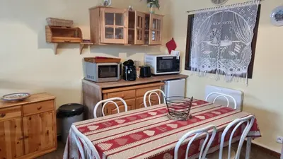 Cuisine ou kitchenette dans l'établissement Chez Mady - Terrasse, Vue Montagne & Proche Ski