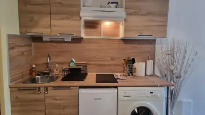 Cuisine ou kitchenette dans l'établissement Chez Mady - Terrasse, Vue Montagne & Proche Ski
