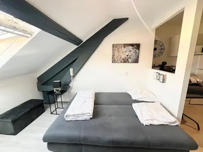 Coin salon dans l'établissement Appartement moderne et central