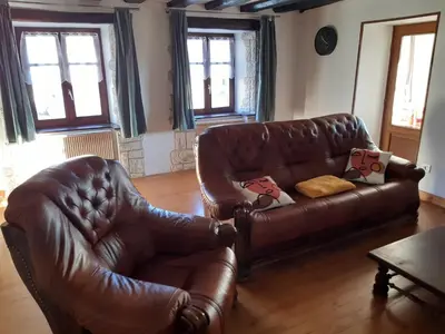 Coin salon dans l'établissement appartement de vacances