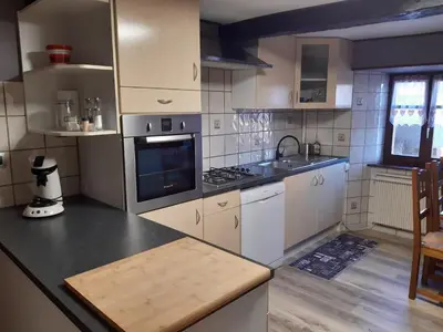 Cuisine ou kitchenette dans l'établissement appartement de vacances
