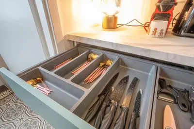 Cuisine ou kitchenette dans l'établissement Unterlinden 12 Appartement de Caractere Parking