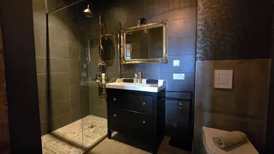 Salle de bains dans l'établissement Le Pavillon de Chasse