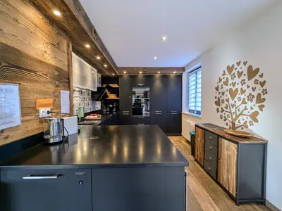 Cuisine ou kitchenette dans l'établissement Évasion montagne à Gérardmer avec terrasse et parking - FR-1-589-793