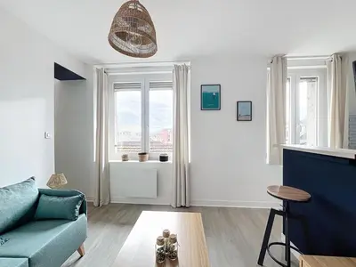 Coin salon dans l'établissement les Toits de Belfort ville