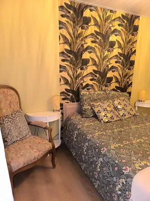 Un ou plusieurs lits dans un hébergement de l'établissement gîte au coeur d'argent