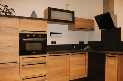 Cuisine ou kitchenette dans l'établissement apartment center Sélestat Le Melimi