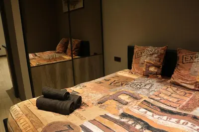 Un ou plusieurs lits dans un hébergement de l'établissement apartment center Sélestat Le Melimi
