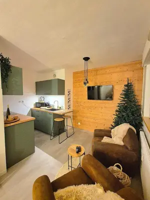 Cuisine ou kitchenette dans l'établissement Le Repaire de la Marmotte