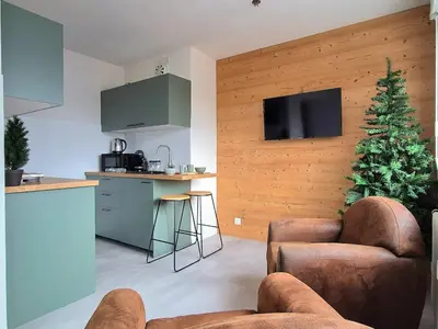 Cuisine ou kitchenette dans l'établissement Le Repaire de la Marmotte