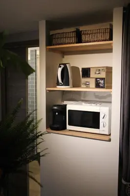 Cuisine ou kitchenette dans l'établissement Studio Malice