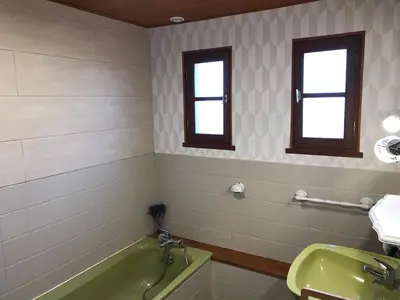 Salle de bains dans l'établissement Refuge des cimes