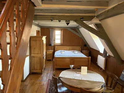 Un ou plusieurs lits dans un hébergement de l'établissement Gîte Gambrinus