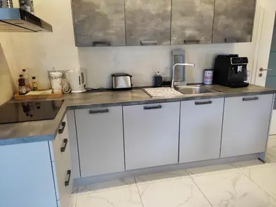 Cuisine ou kitchenette dans l'établissement LOZEN avec piscine privée intérieure