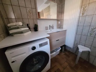 Salle de bains dans l'établissement Au gré des Saisons - côté terrasse
