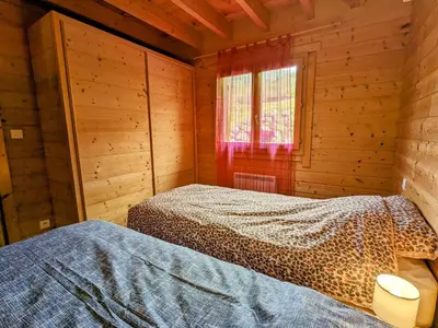 Un ou plusieurs lits dans un hébergement de l'établissement Chalet spacieux à La Bresse, idéal pour familles et amis - FR-1-589-679