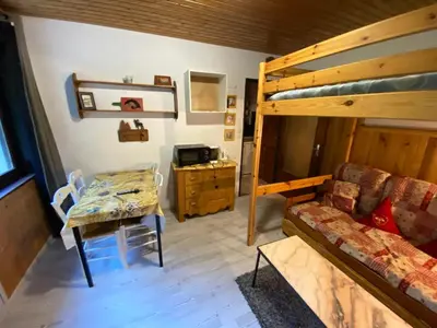 Un ou plusieurs lits dans un hébergement de l'établissement Studio cosy à La Bresse, 18 m² avec équipements
