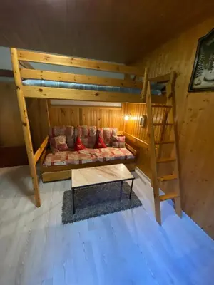 Un ou plusieurs lits dans un hébergement de l'établissement Studio cosy à La Bresse, 18 m² avec équipements