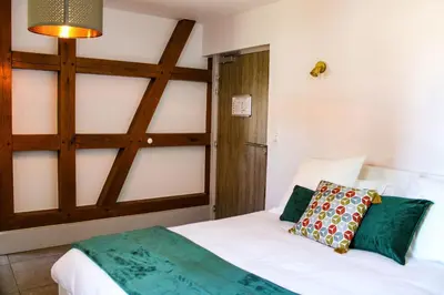 Un ou plusieurs lits dans un hébergement de l'établissement L'Auberge du canal