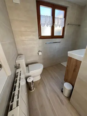 Salle de bains dans l'établissement La Chouette