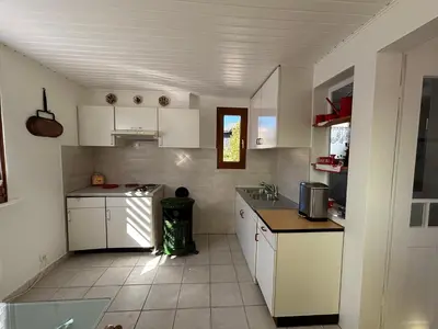 Cuisine ou kitchenette dans l'établissement La Chouette