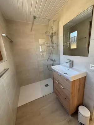 Salle de bains dans l'établissement La Chouette