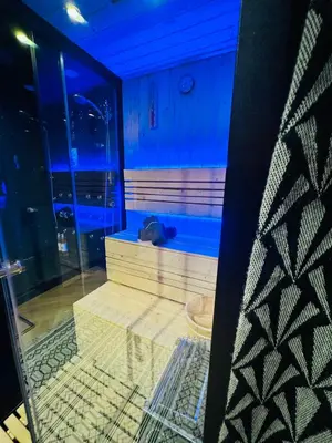 Coin salon dans l'établissement Suite Richovilare - Sauna & Hammam