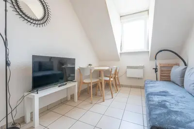 Télévision ou salle de divertissement dans l'établissement Bel appartement 4Pers Stationnement Gratuit Centre