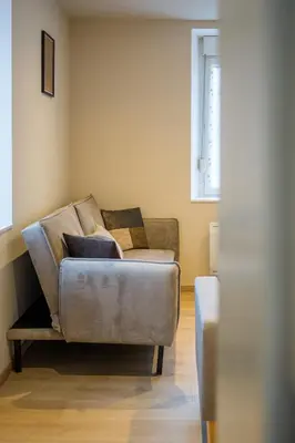 Coin salon dans l'établissement Le 60-Appart'Hôtel-GregIMMO
