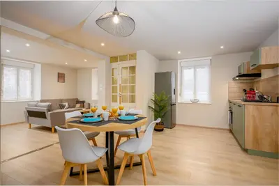 Cuisine ou kitchenette dans l'établissement Le 60-Appart'Hôtel-GregIMMO