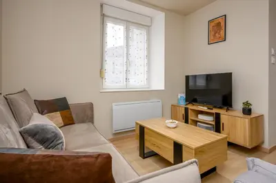 Télévision ou salle de divertissement dans l'établissement Le 60-Appart'Hôtel-GregIMMO