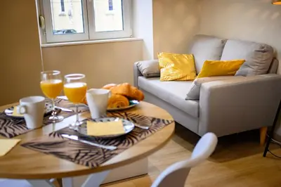 Coin salon dans l'établissement Le 61-Appart'Hôtel-GregIMMO