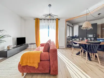 Coin salon dans l'établissement Saint-Louis - Cozy Apartment Close to Switzerland & Train Station