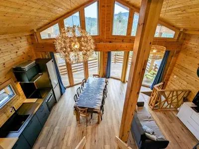 Télévision ou salle de divertissement dans l'établissement Chalet L 'instant Géromois